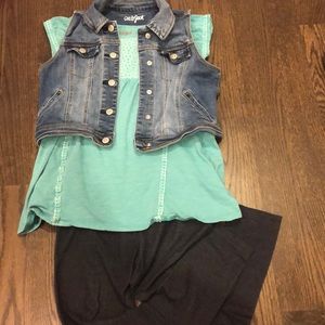 Shirt, vest, and legging outfit.